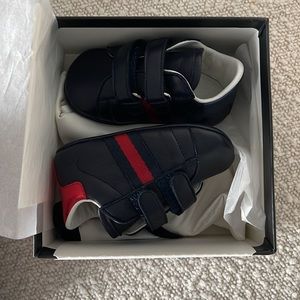 Brand new Gucci baby shoes! Navy, leather. Never worn.